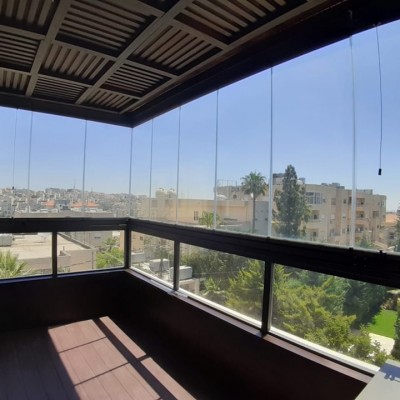 Безрамное  остекление