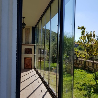 Безрамное  остекление